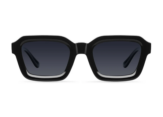 Black sunglasses with dark lenses on a white background